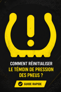 Un tableau de bord de voiture montrant le témoin de pression des pneus allumé